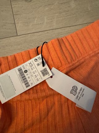 Pantalón naranja fino Stradivarius Talla XS