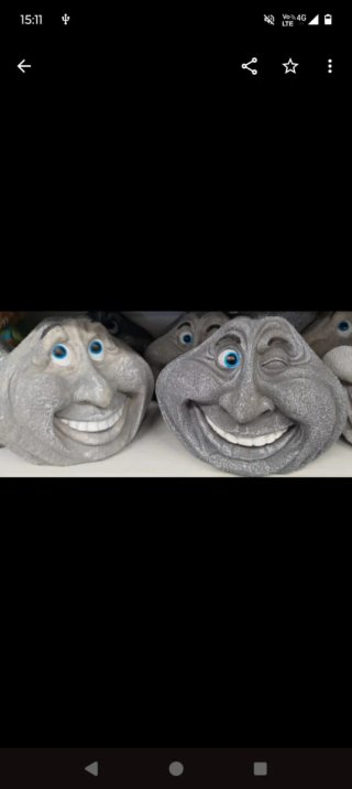 Figura Decorativa Cara Piedra Sonriente