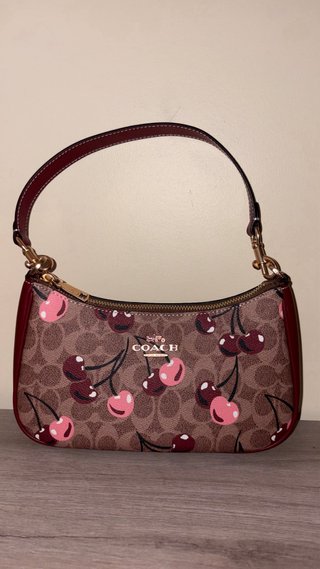 Bolsa Coach com estampa de cerejas
