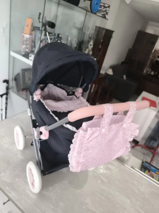 Carrito de muñecas azul y rosa