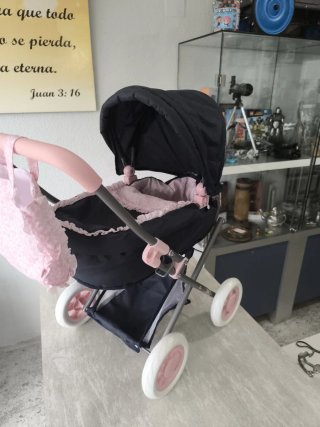 Carrito de muñecas azul y rosa