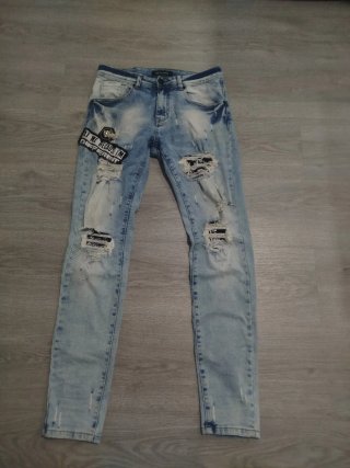 Pantalones vaqueros rotos talla S
