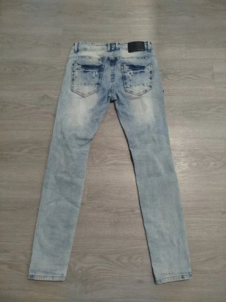 Pantalones vaqueros rotos talla S
