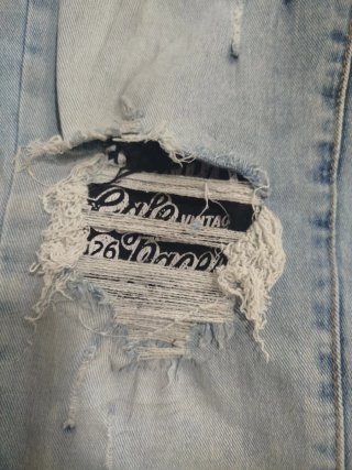 Pantalones vaqueros rotos talla S