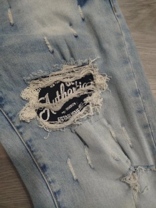 Pantalones vaqueros rotos talla S