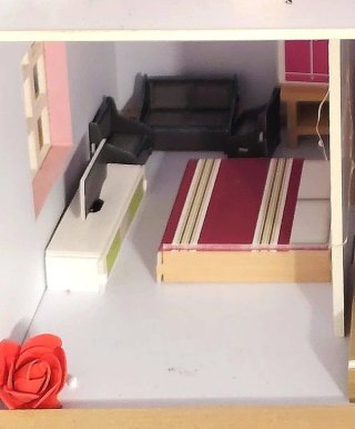 Casa de muñecas con mobiliario