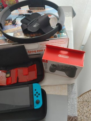 Nintendo Switch + Giochi e Accessori