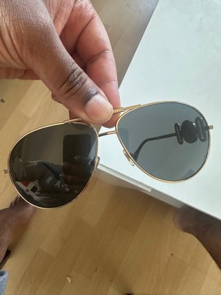 Gafas de sol Versace doradas y negras