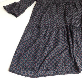 Mini abito blu oversize a balze con stampa geometr