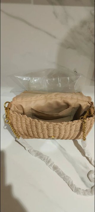 Bolso de rafia beige con detalle teal