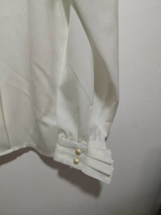 Camisa blanca manga larga abotonada