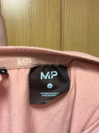 Camiseta MyProtein sin mangas rosa