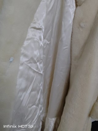 Cappotto in pelliccia ecologica beige