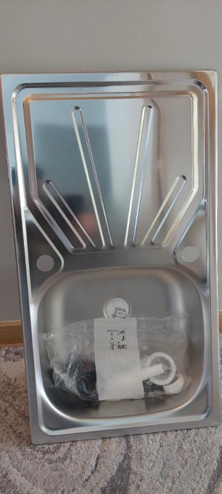 Fregadero de acero inoxidable con escurridor