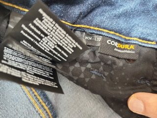 Pantalones moteros con protección rodillas