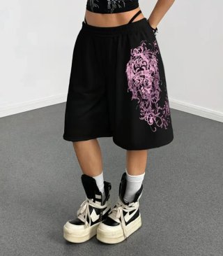 Bermudas negras con estampado rosa