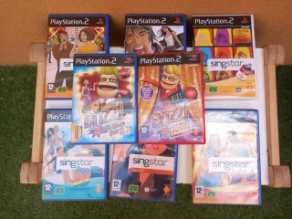 PlayStation 2 + 4 Micrófonos SingStar + juegos
