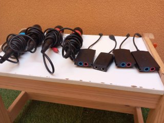 PlayStation 2 + 4 Micrófonos SingStar + juegos