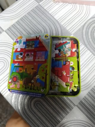 Puzzle infantil en lata