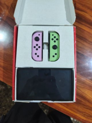 Nintendo Switch OLED verde / Rosa