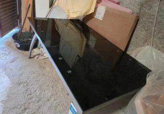 Mesa de cristal extensible