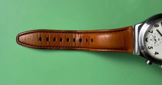 Reloj Swatch Cuero Blanco Naranja