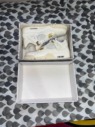 Air Jordan 4 Retro Metallic Gold