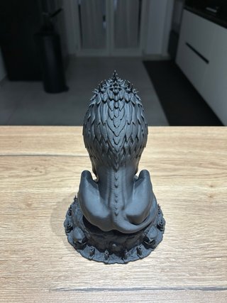 Statua Leone Nero con Teschi