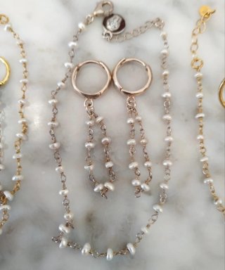 Conjunto Pulsera y Pendientes Perlas río, plata925
