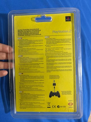 Mando DualShock 2 Negro PS2 con etiqueta SATURN