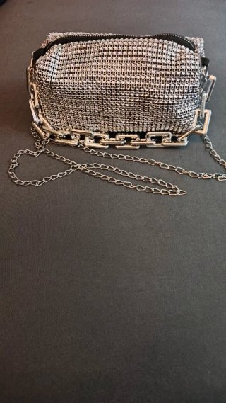 Bolso fiesta plateado con asas y bandolera