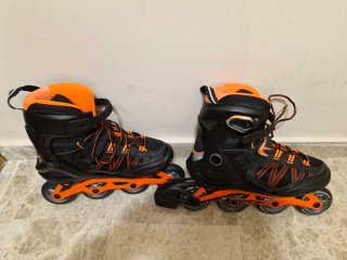 Patines en línea negros y naranjas,talla 39.