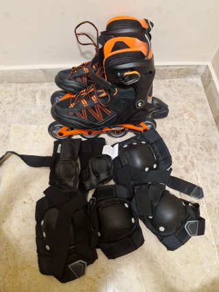 Patines en línea negros y naranjas,talla 39.