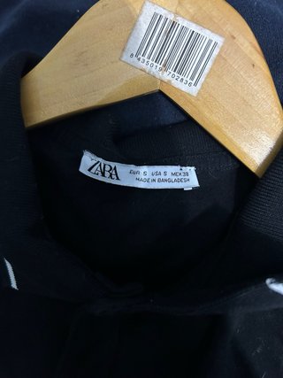 Polo negro hombre
