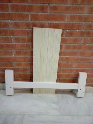 Cuna blanca con barrotes