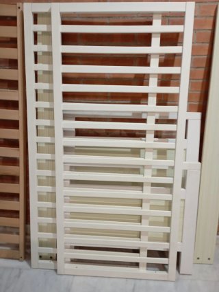 Cuna blanca con barrotes