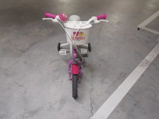 Bicicleta infantil niña rosa con ruedines