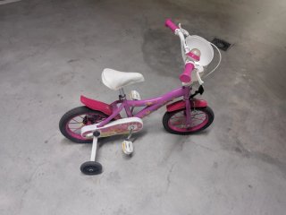 Bicicleta infantil niña rosa con ruedines