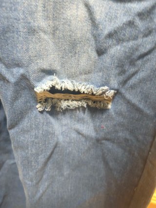 Vaqueros rotos azules