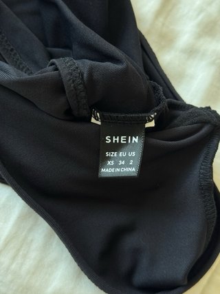 Top a maniche lunghe + jeans corti