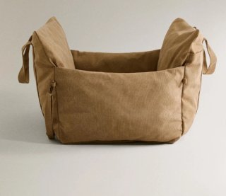 Cama para perros beige