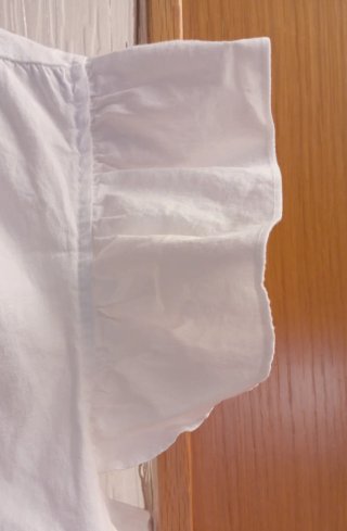 Blusa blanca bordada.