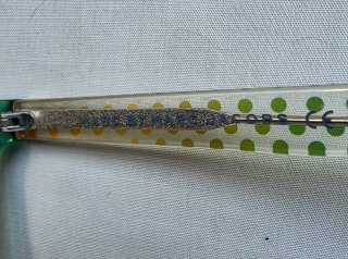 Occhiali da sole verdi con stampa a pois