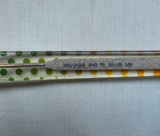 Occhiali da sole verdi con stampa a pois
