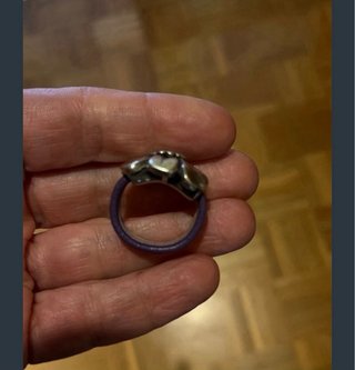 Anillo artesanal flor plata y piel