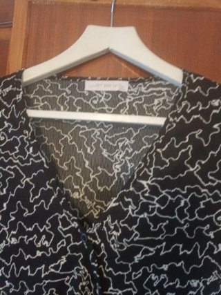 Blusa estampada manga larga