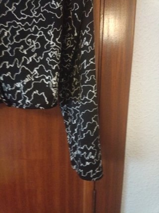 Blusa estampada manga larga