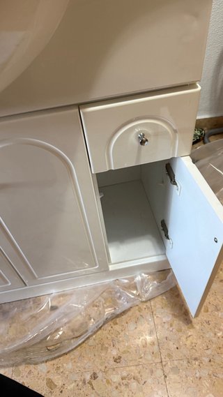 Mueble de baño con lavabo de mármol