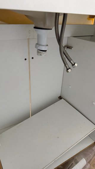 Mueble de baño con lavabo de mármol