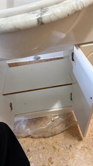 Mueble de baño con lavabo de mármol